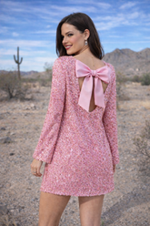 Pink sequin dress with bow accent