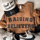RAISING BELIEVERS SWEATSHIRT